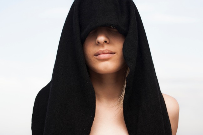 Canva - Photo of Woman With Black Towel on Her Head